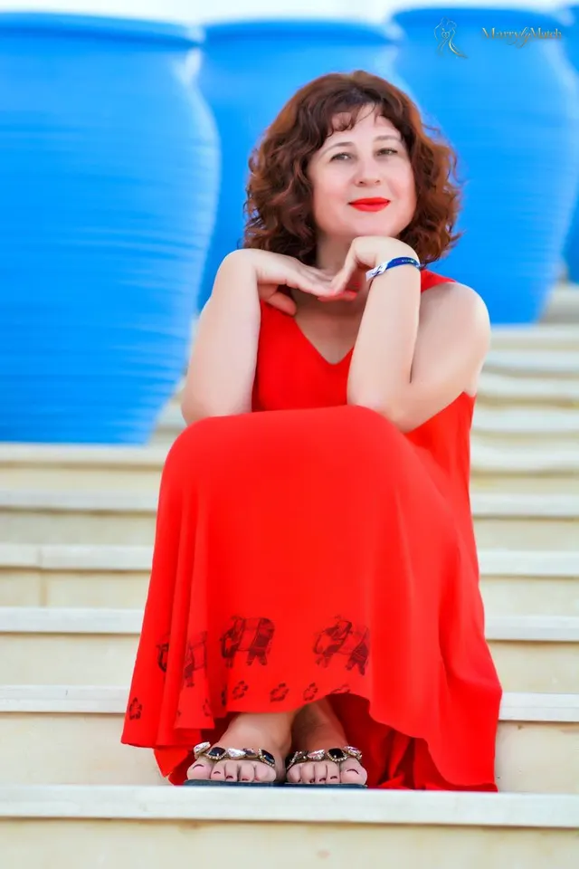 Elena, 51