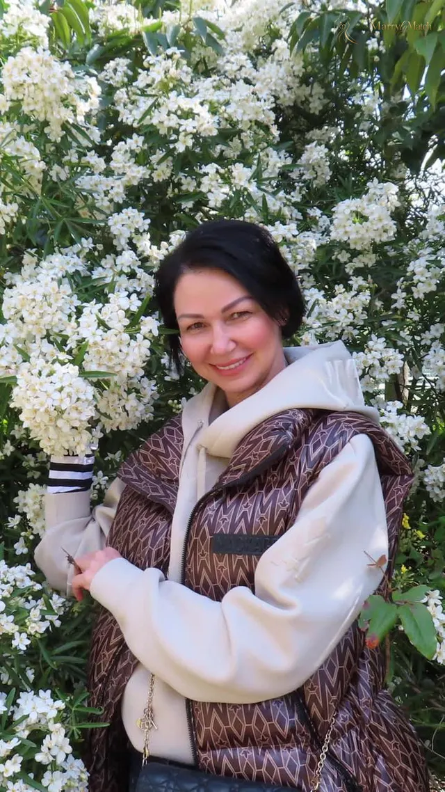Natalia, 56