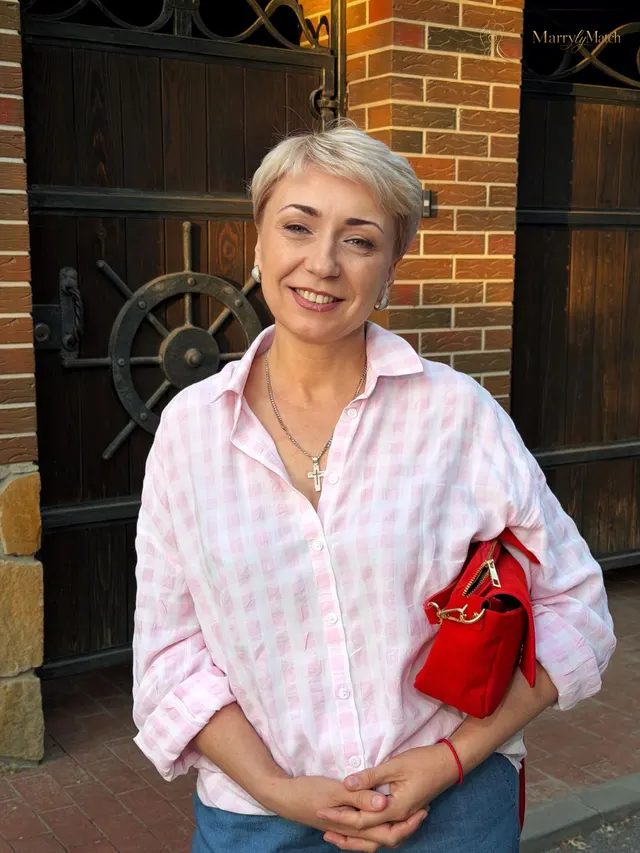 Tetiana, 49